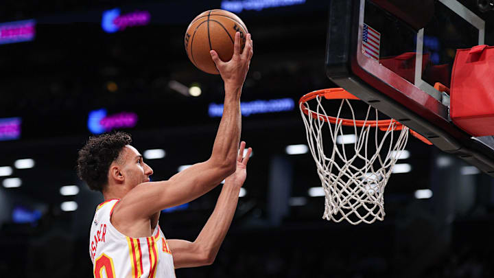 Mar 16, 2025; Brooklyn, New York, USA; Atlanta Hawks forward Zaccharie Risacher (10) goes to the basket during the first quarter against the Brooklyn Nets at Barclays Center. Mandatory Credit: Vincent Carchietta-Imagn Images