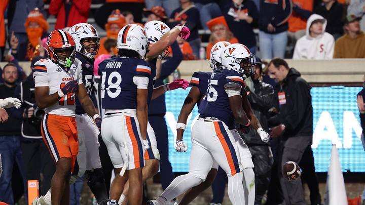 Oct 10, 2026; Charlottesville, Virginia, USA; Virginia Cavaliers running back Xay Davis (25) celebrates with teammates after scoring a touchdown against the Syracuse Orange during the first half at Scott Stadium. Mandatory Credit: Geoff Burke-Imagn Images