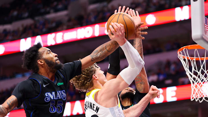 Mar 21, 2024; Dallas, Texas, USA;  Utah Jazz forward Lauri Markkanen (23) shoots as Dallas Mavericks