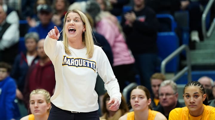 Dec 31, 2023; Hartford, Connecticut, USA; Marquette Golden Eagles head coach Megan Duffy watches