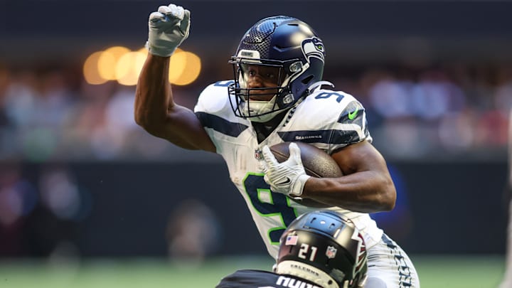 Oct 20, 2024; Atlanta, Georgia, USA; Seattle Seahawks running back Kenneth Walker III (9) runs the ball against the Atlanta Falcons in the first quarter at Mercedes-Benz Stadium.