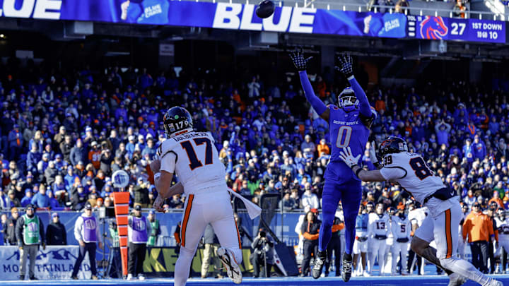 Oregon State's Ben Gulbranson throws over Boise State's Ty Benefield at Albertsons Stadium.