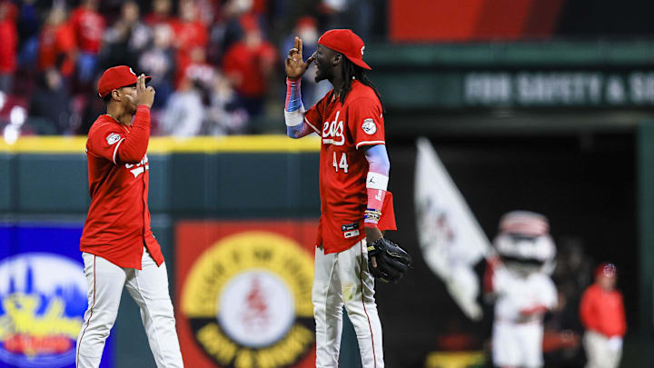 Apr 12, 2025; Cincinnati, Ohio, USA; Cincinnati Reds shortstop Elly De La Cruz (44) reacts with third baseman Noelvi Marte (16) after the victory over the Pittsburgh Pirates at Great American Ball Park. Mandatory Credit: Katie Stratman-Imagn Images
