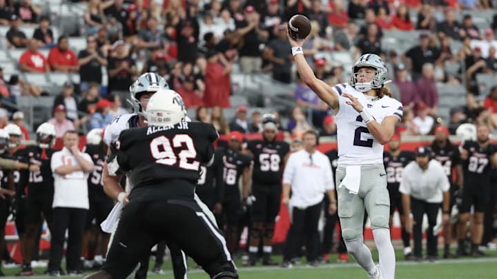 Nov 2, 2024; Houston, Texas, USA; Kansas State Wildcats quarterback Avery Johnson (2) throws the ball against the Houston Cougars in the first quarter at TDECU Stadium. Mandatory Credit: Thomas B. Shea-Imagn Images