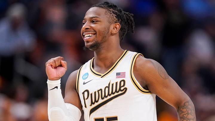 Purdue Boilermakers guard Lance Jones (55) celebrates while jogging off the court. Purdue Boilermakers guard Lance Jones (55) celebrates while jogging off the court.