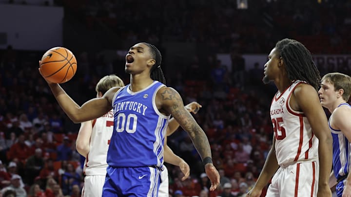 Feb 26, 2025; Norman, Oklahoma, USA; Kentucky Wildcats guard Otega Oweh (00) reacts after a play against the Oklahoma Sooners during the first half at Lloyd Noble Center. Mandatory Credit: Alonzo Adams-Imagn Images