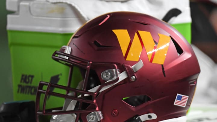 Nov 14, 2024; Philadelphia, Pennsylvania, USA; Washington Commanders helmet sits on the sidelines against the Philadelphia Eagles at Lincoln Financial Field. Mandatory Credit: Eric Hartline-Imagn Images