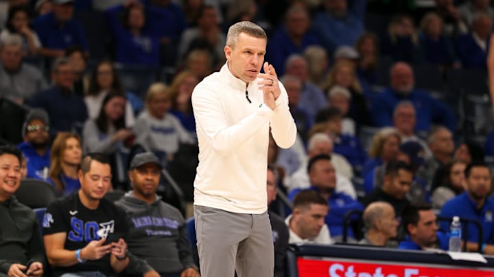 Jan 5, 2025; Memphis, Tennessee, USA; North Texas Mean Green head coach Ross Hodge reacts against the Memphis Tigers during the second half at FedExForum. Mandatory Credit: Wesley Hale-Imagn Images