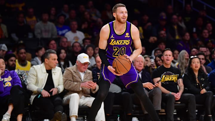 Jan 11, 2024; Los Angeles, California, USA; Los Angeles Lakers guard Dylan Windler (20) controls the ball against the Phoenix Suns during the second half at Crypto.com Arena.