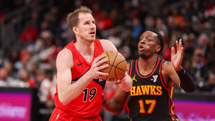 Jan 23, 2025; Atlanta, Georgia, USA; Toronto Raptors center Jakob Poeltl (19) drives on Atlanta Hawks forward Onyeka Okongwu (17) in the third quarter at State Farm Arena. Mandatory Credit: Brett Davis-Imagn Images Jan 23, 2025; Atlanta, Georgia, USA; Toronto Raptors center Jakob Poeltl (19) drives on Atlanta Hawks forward Onyeka Okongwu (17) in the third quarter at State Farm Arena. Mandatory Credit: Brett Davis-Imagn Images