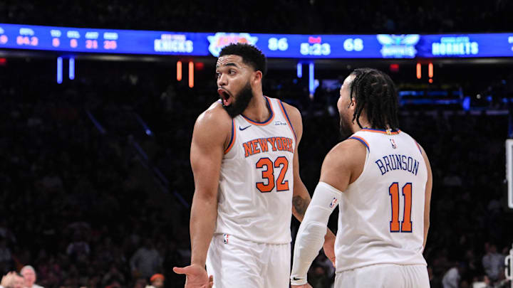 Dec 5, 2024; New York, New York, USA; New York Knicks center Karl-Anthony Towns (32) and New York Knicks guard Jalen Brunson (11) react during the second half against the Charlotte Hornets at Madison Square Garden. Mandatory Credit: John Jones-Imagn Images