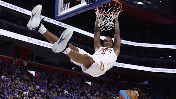 May 13, 2026; Detroit, Michigan, USA; Cleveland Cavaliers center Evan Mobley (4) dunks on Detroit Pistons forward Tobias Harris (12) in the first half during game five of the second round of the 2026 NBA Playoffs at Little Caesars Arena. Mandatory Credit: Rick Osentoski-Imagn Images