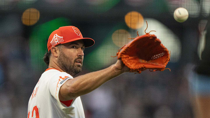 Aug 20, 2024; San Francisco, California, USA;  San Francisco Giants pitcher Robbie Ray (23) catches the ball during the third inning against the Chicago White Sox at Oracle Park. 
