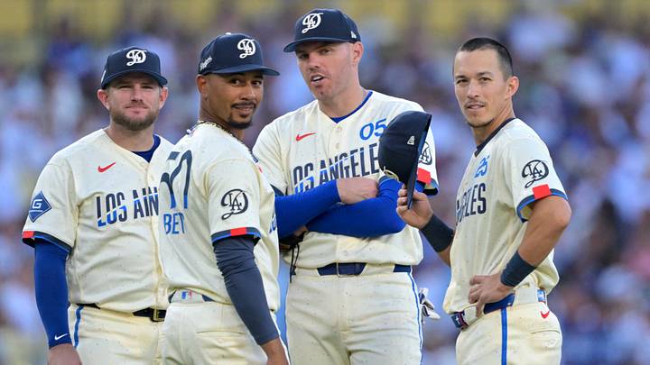 Aug 22, 2026; Los Angeles, California, USA;Los Angeles Dodgers third baseman Max Muncy (13), shortstop Mookie Betts (50), first baseman Freddie Freeman (5) and second baseman Tommy Edman (25) look in to the Pittsburgh Pirates dugout during the eighth inning at Dodger Stadium. Mandatory Credit: Jayne Kamin-Oncea-Imagn Images Aug 22, 2026; Los Angeles, California, USA;Los Angeles Dodgers third baseman Max Muncy (13), shortstop Mookie Betts (50), first baseman Freddie Freeman (5) and second baseman Tommy Edman (25) look in to the Pittsburgh Pirates dugout during the eighth inning at Dodger Stadium. Mandatory Credit: Jayne Kamin-Oncea-Imagn Images