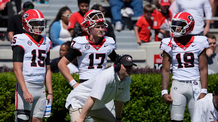 Georgia quarterbacks Ryan Montgomery (15), Colter Finn (17) and Hezekiah Millender (19) looks on during the Georgia G-Day spring football game in Athens, Ga., on Saturday, April 12, 2025.