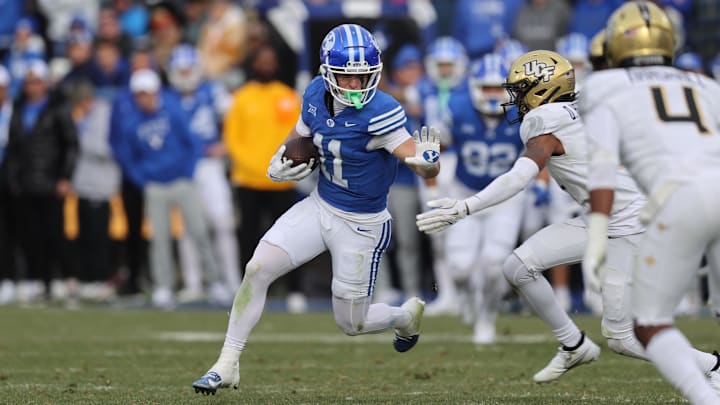 Nov 29, 2025; Provo, Utah, USA; BYU Cougars wide receiver Parker Kingston (11) runs after a catch against the UCF Knights during the second half at LaVell Edwards Stadium. Mandatory Credit: Rob Gray-Imagn Images
