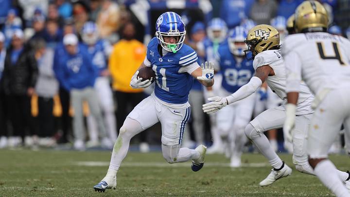 Nov 29, 2025; Provo, Utah, USA; BYU Cougars wide receiver Parker Kingston (11) runs after a catch against the UCF Knights during the second half at LaVell Edwards Stadium. Mandatory Credit: Rob Gray-Imagn Images Nov 29, 2025; Provo, Utah, USA; BYU Cougars wide receiver Parker Kingston (11) runs after a catch against the UCF Knights during the second half at LaVell Edwards Stadium. Mandatory Credit: Rob Gray-Imagn Images