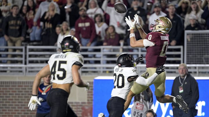 Nov 1, 2025; Tallahassee, Florida, USA; Florida State Seminoles wide receiver Duce Robinson (0) catches a pass during the second half against the Wake Forest Demon Deacons at Doak S. Campbell Stadium. Mandatory Credit: Melina Myers-Imagn Images