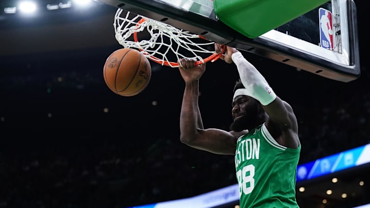 Apr 12, 2024; Boston, Massachusetts, USA; Boston Celtics center Neemias Queta (88) makes the basket against the Charlotte Hornets in the second quarter at TD Garden. Mandatory Credit: David Butler II-Imagn Images