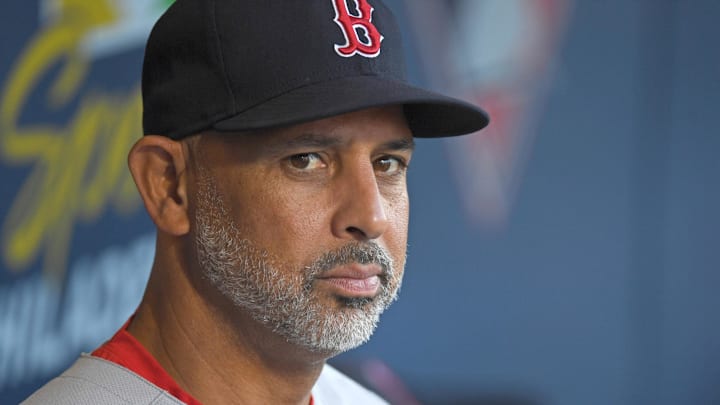 Jul 21, 2025; Philadelphia, Pennsylvania, USA; Boston Red Sox manager Alex Cora (13) in the dugout against the Philadelphia Phillies at Citizens Bank Park. Mandatory Credit: Eric Hartline-Imagn Images