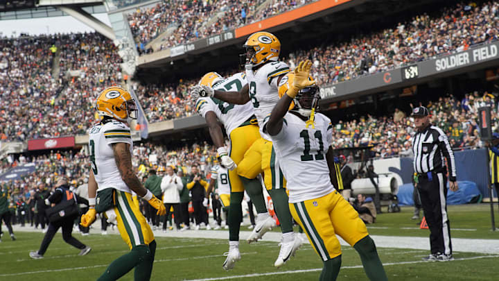Nov 17, 2024; Chicago, Illinois, USA; Green Bay Packers running back Josh Jacobs (8) celebrates his touchdown against the Chicago Bears during the second half at Soldier Field. Mandatory Credit: David Banks-Imagn Images