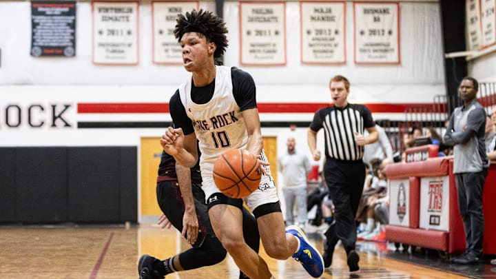 The Rock National Lions guard Joseph Hartman (10) drives to the basket against the FSUS Seminoles during the first half at The Rock School in Gainesville, FL on Friday, January 19, 2024. [Matt Pendleton/Gainesville Sun]