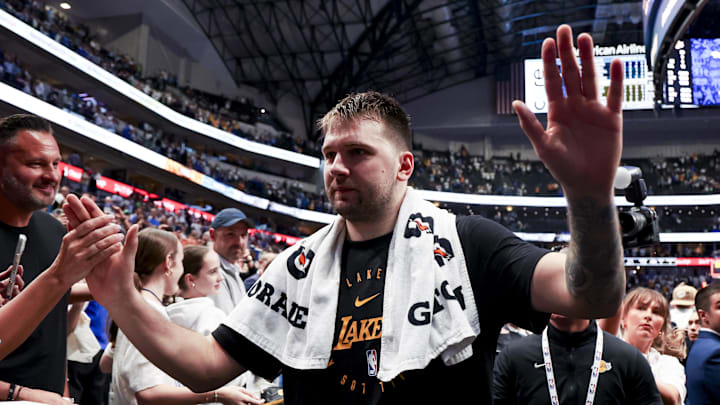 Apr 9, 2025; Dallas, Texas, USA;  Los Angeles Lakers guard Luka Doncic (77) waves to fans after the game against the Dallas Mavericks at American Airlines Center. Mandatory Credit: Kevin Jairaj-Imagn Images