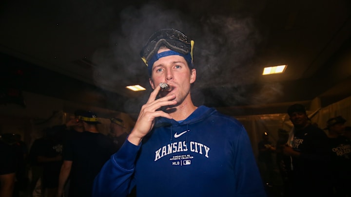 Kansas City Royals starting pitcher Kyle Wright (30) celebrates after clinching a wild card playoff birth after a game against the Atlanta Braves at Truist Park on Sept 27.