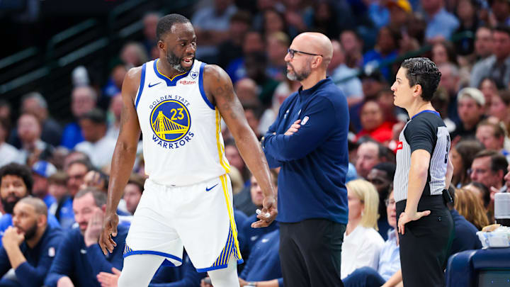 Apr 5, 2024; Dallas, Texas, USA; Golden State Warriors forward Draymond Green (23) and Dallas Mavericks head coach Jason Kidd