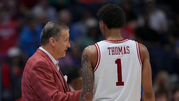 Mar 14, 2026; Nashville, TN, USA; Arkansas Razorbacks head coach John Calipari talks with guard Meleek Thomas (1) against the Mississippi Rebels during the second half at Bridgestone Arena. Mar 14, 2026; Nashville, TN, USA; Arkansas Razorbacks head coach John Calipari talks with guard Meleek Thomas (1) against the Mississippi Rebels during the second half at Bridgestone Arena.