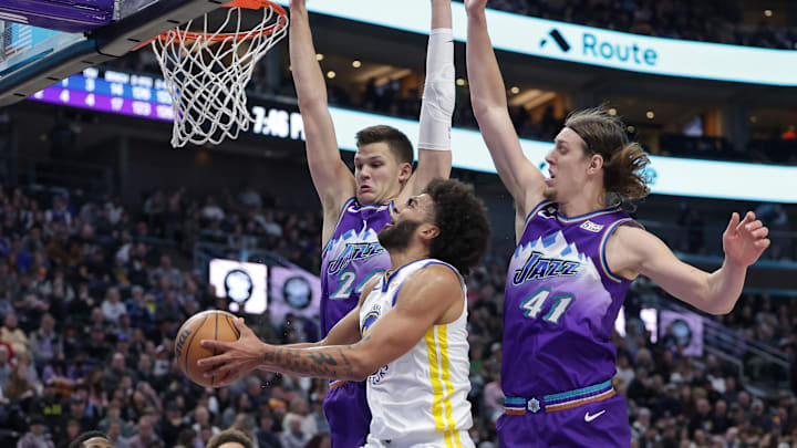 Dec 7, 2022; Salt Lake City, Utah, USA;  Golden State Warriors forward Anthony Lamb (40) is defended by Utah Jazz center Walker Kessler (24) and forward Kelly Olynyk (41) during the second quarter at Vivint Arena. Mandatory Credit: Chris Nicoll-Imagn Images