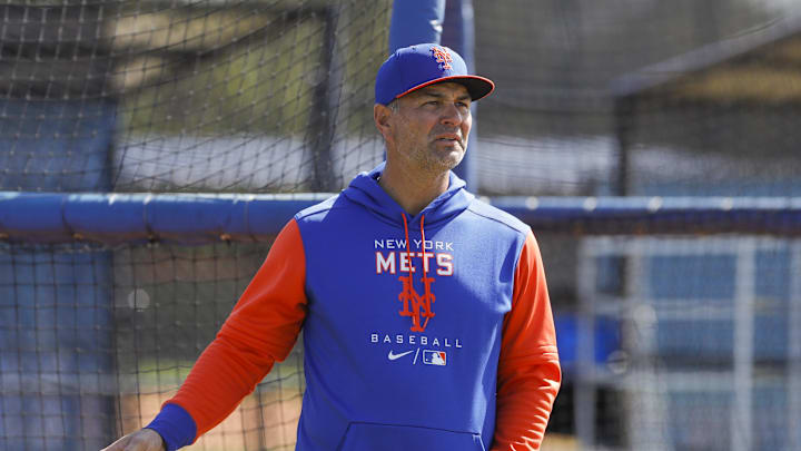 Mar 13, 2022; Port St. Lucie, FL, USA; New York Mets hitting coach Eric Chavez looks on as players