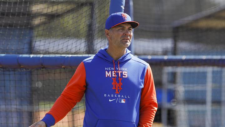 Mar 13, 2022; Port St. Lucie, FL, USA; New York Mets hitting coach Eric Chavez looks on as players take batting practice during spring training. Mandatory Credit: Sam Navarro-Imagn Images