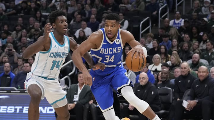 Nov 23, 2024; Milwaukee, Wisconsin, USA; Milwaukee Bucks forward Giannis Antetokounmpo (34) drives to the basket against Charlotte Hornets forward Moussa Diabate (14) in the first half at Fiserv Forum. Mandatory Credit: Michael McLoone-Imagn Images Nov 23, 2024; Milwaukee, Wisconsin, USA; Milwaukee Bucks forward Giannis Antetokounmpo (34) drives to the basket against Charlotte Hornets forward Moussa Diabate (14) in the first half at Fiserv Forum. Mandatory Credit: Michael McLoone-Imagn Images
