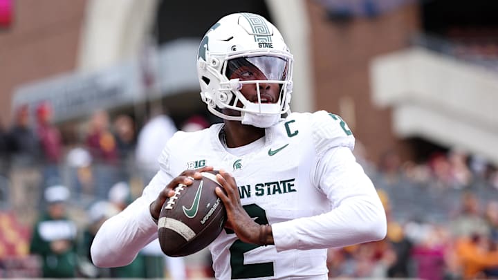 Nov 1, 2025; Minneapolis, Minnesota, USA; Michigan State Spartans quarterback Aidan Chiles (2) warms up before the game against the Minnesota Golden Gophers at Huntington Bank Stadium. Mandatory Credit: Matt Krohn-Imagn Images Nov 1, 2025; Minneapolis, Minnesota, USA; Michigan State Spartans quarterback Aidan Chiles (2) warms up before the game against the Minnesota Golden Gophers at Huntington Bank Stadium. Mandatory Credit: Matt Krohn-Imagn Images
