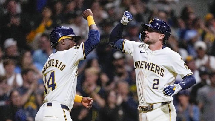 Aug 26, 2025; Milwaukee, Wisconsin, USA; Milwaukee Brewers second baseman Brice Turang (2) celebrates with shortstop Andruw Monasterio (14) after hitting a home run during the sixth inning against the Arizona Diamondbacks at American Family Field. Mandatory Credit: Jeff Hanisch-Imagn Images Aug 26, 2025; Milwaukee, Wisconsin, USA; Milwaukee Brewers second baseman Brice Turang (2) celebrates with shortstop Andruw Monasterio (14) after hitting a home run during the sixth inning against the Arizona Diamondbacks at American Family Field. Mandatory Credit: Jeff Hanisch-Imagn Images