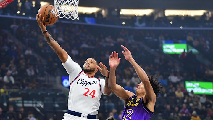 Jan 19, 2025; Inglewood, California, USA; Los Angeles Clippers guard Norman Powell (24) shoots against Los Angeles Lakers guard Max Christie (12) during the first half at Intuit Dome. Mandatory Credit: Gary A. Vasquez-Imagn Images Jan 19, 2025; Inglewood, California, USA; Los Angeles Clippers guard Norman Powell (24) shoots against Los Angeles Lakers guard Max Christie (12) during the first half at Intuit Dome. Mandatory Credit: Gary A. Vasquez-Imagn Images