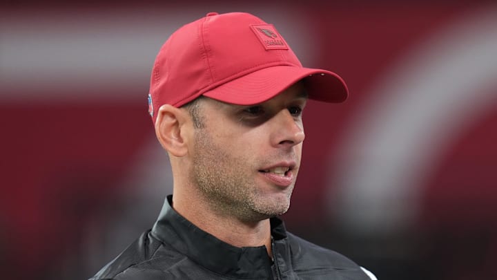 Arizona Cardinals head coach Jonathan Gannon embraces team owner Michael Bidwill before the team plays the Jacksonville Jaguars at State Farm Stadium on Nov. 23, 2025.