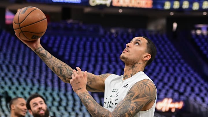 Apr 27, 2025; Milwaukee, Wisconsin, USA; Milwaukee Bucks forward Kyle Kuzma (18) warms up before game four of first round for the 2024 NBA Playoffs against the Indiana Pacers at Fiserv Forum. Mandatory Credit: Benny Sieu-Imagn Images Apr 27, 2025; Milwaukee, Wisconsin, USA; Milwaukee Bucks forward Kyle Kuzma (18) warms up before game four of first round for the 2024 NBA Playoffs against the Indiana Pacers at Fiserv Forum. Mandatory Credit: Benny Sieu-Imagn Images