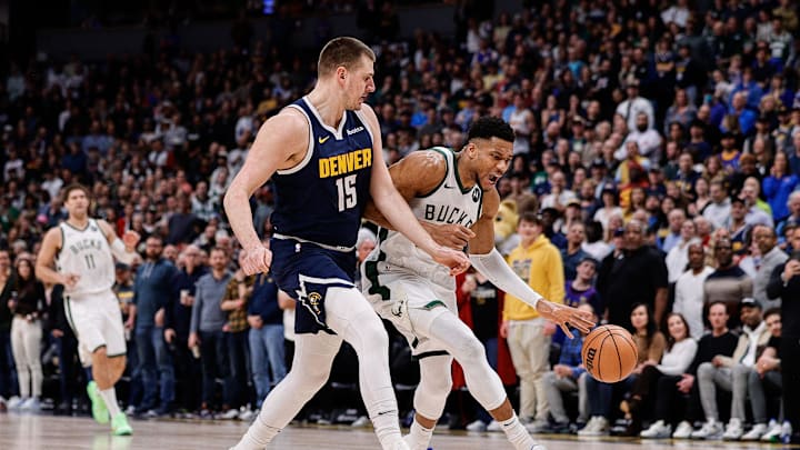 Jan 29, 2024; Denver, Colorado, USA; Milwaukee Bucks forward Giannis Antetokounmpo (34) drives to the basket against Denver Nuggets center Nikola Jokic (15) in the first quarter at Ball Arena. Mandatory Credit: Isaiah J. Downing-Imagn Images Jan 29, 2024; Denver, Colorado, USA; Milwaukee Bucks forward Giannis Antetokounmpo (34) drives to the basket against Denver Nuggets center Nikola Jokic (15) in the first quarter at Ball Arena. Mandatory Credit: Isaiah J. Downing-Imagn Images