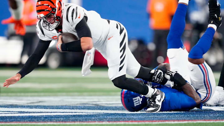 The Giants sacks Cincinnati Bengals quarterback Joe Burrow (9) in East Rutherford during the first quarter, Sunday, October 13, 2024. The Giants sacks Cincinnati Bengals quarterback Joe Burrow (9) in East Rutherford during the first quarter, Sunday, October 13, 2024.