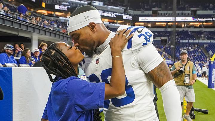 Simone Biles kisses and does a handshake with her husband Indianapolis Colts safety Jonathan Owens (38) on Saturday, Aug. 29, 2026, ahead of the game against the Detroit Lions at Lucas Oil Stadium in Indianapolis. Simone Biles kisses and does a handshake with her husband Indianapolis Colts safety Jonathan Owens (38) on Saturday, Aug. 29, 2026, ahead of the game against the Detroit Lions at Lucas Oil Stadium in Indianapolis.