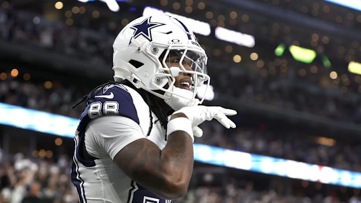 Dec 9, 2024; Arlington, Texas, USA; Dallas Cowboys wide receiver CeeDee Lamb (88) reacts after scoring a touchdown against the Cincinnati Bengals in the first quarter at AT&T Stadium. Mandatory Credit: Tim Heitman-Imagn Images