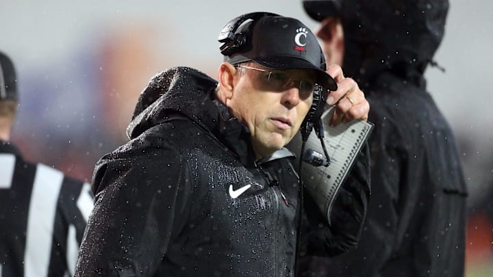 Jan 2, 2026; Memphis, TN, USA; Cincinnati Bearcats head coach Scott Satterfield reacts during the second quarter against the Navy Midshipmen at Simmons Bank Liberty Stadium. Mandatory Credit: Petre Thomas-Imagn Images