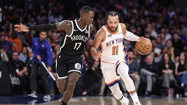 Nov 17, 2024; New York, New York, USA;  New York Knicks guard Jalen Brunson (11) looks to drive past Brooklyn Nets guard Dennis Schroder (17) in the fourth quarter at Madison Square Garden. Mandatory Credit: Wendell Cruz-Imagn Images
