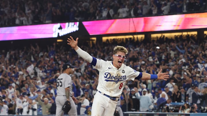 Oct 25, 2024; Los Angeles, California, USA; Los Angeles Dodgers third baseman Enrique Hernandez (8) celebrates deafening the New York Yankees during game one of the 2024 MLB World Series at Dodger Stadium. Mandatory Credit:  Jason Parkhurst-Imagn Images