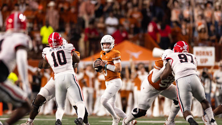 Oct 19, 2024; Austin, Texas, USA; Texas Longhorns quarterback Quinn Ewers (3) drops back to pass against the Georgia Bulldogs during the first half at Darrell K Royal-Texas Memorial Stadium. Mandatory Credit: Brett Patzke-Imagn Images