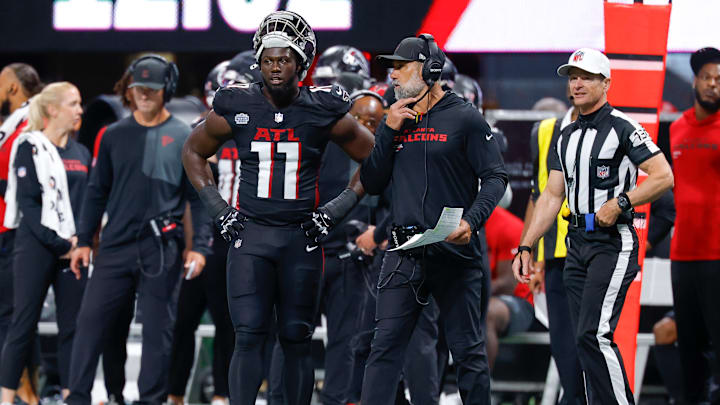 Atlanta Falcons defensive coordinator Jeff Ulbrich and linebacker Jalon Walker