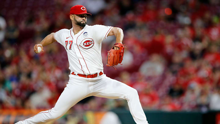 Cincinnati Reds relief pitcher Art Warren (77) throws a pitch.