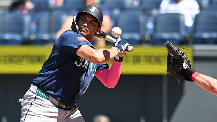 Jun 28, 2026; Cleveland, Ohio, USA; Seattle Mariners first baseman Josh Naylor (12) is hit by a pitch during the sixth inning against the Cleveland Guardians at Progressive Field. Mandatory Credit: Ken Blaze-Imagn Images